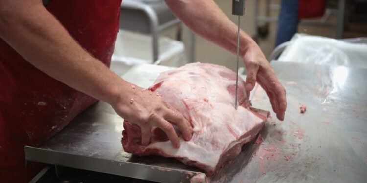 What is industrial meat and why is it considered harmful
